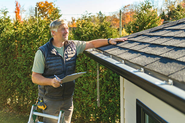 Professional Roofing technician working in Wayland, IA